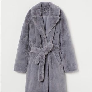 Faux fur coat size medium .